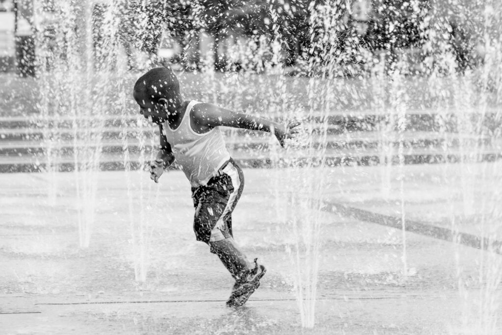 Boy Playing in Longwood Fountains