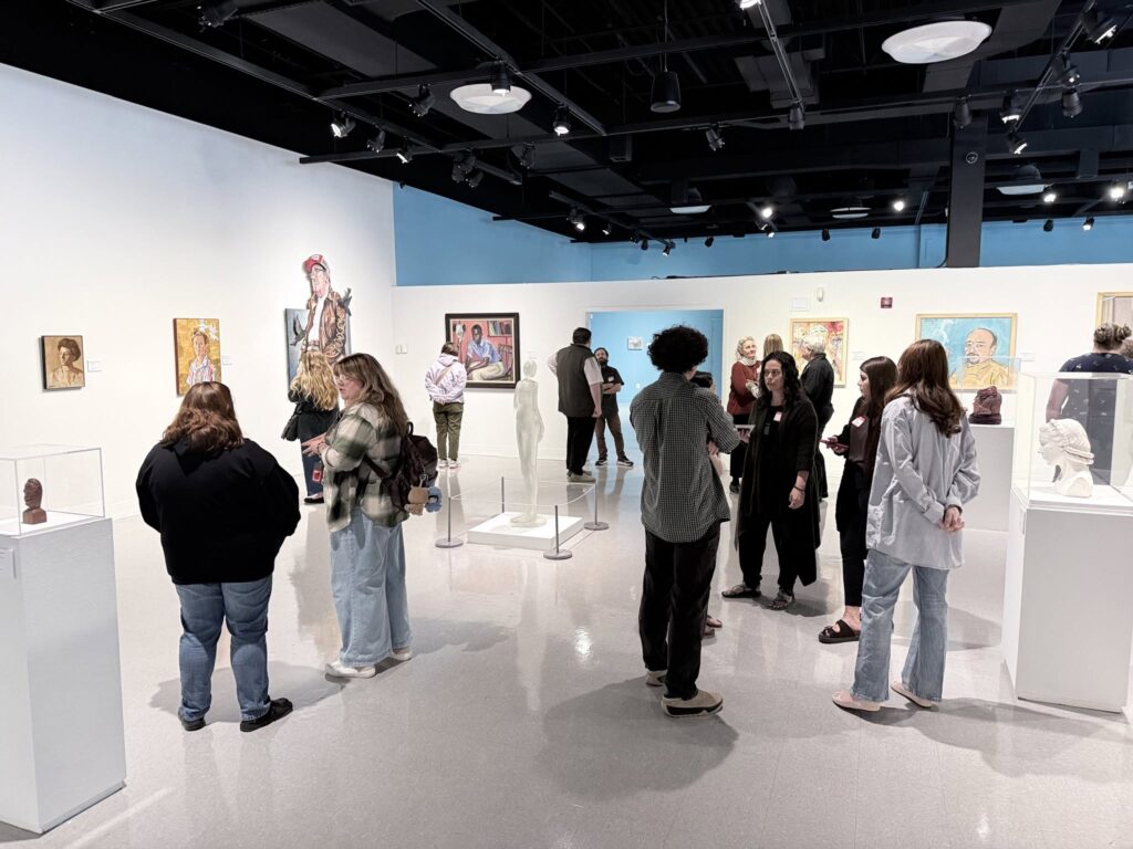 People visiting an art gallery LCVA