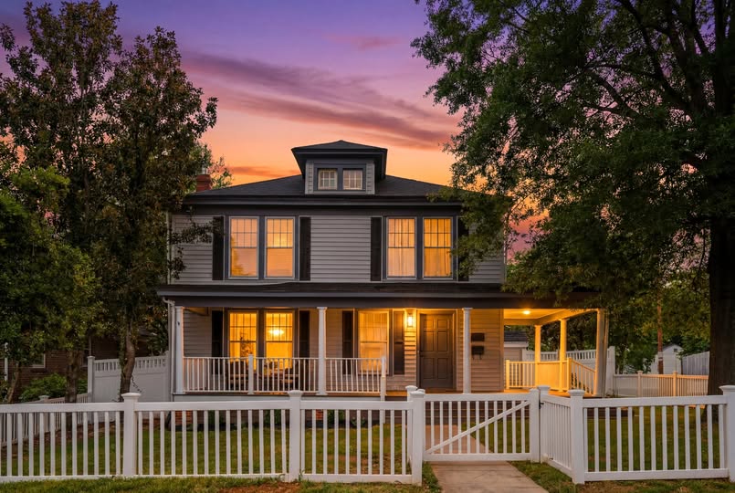 Photo of the two story house at sunset